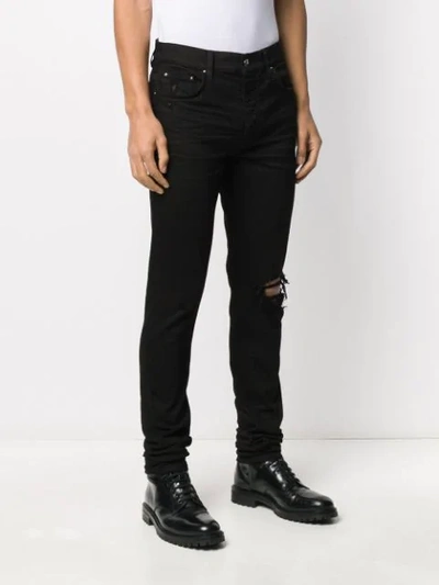 Amiri Distressed Slim Fit Jeans In Black