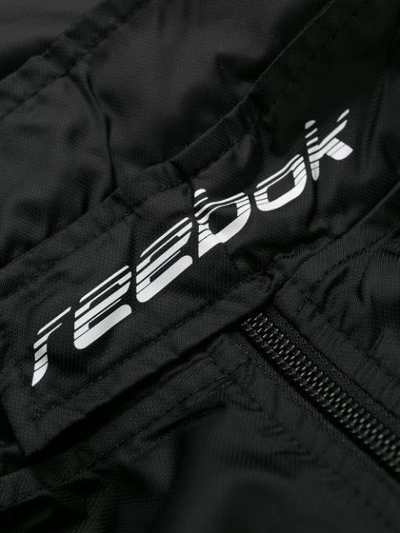 Shop Reebok Logo Strap Jacket In Black
