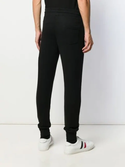 Shop Moncler Logo Print Track Pants In Black