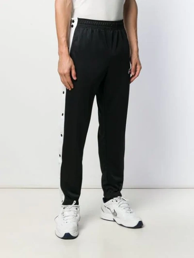 Shop Nike Logo Patch Track Pants In Black