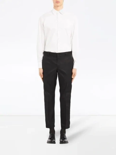 Shop Prada Technical Fabric Trousers - Black