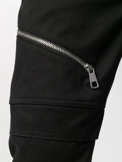 Shop Neil Barrett Motorcross Zipped Trousers In Black