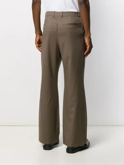 Shop Martine Rose Double Flare Tailored Trousers In Brown