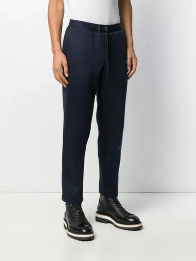 Shop Moncler Logo Patch Cropped Track Pants In Blue