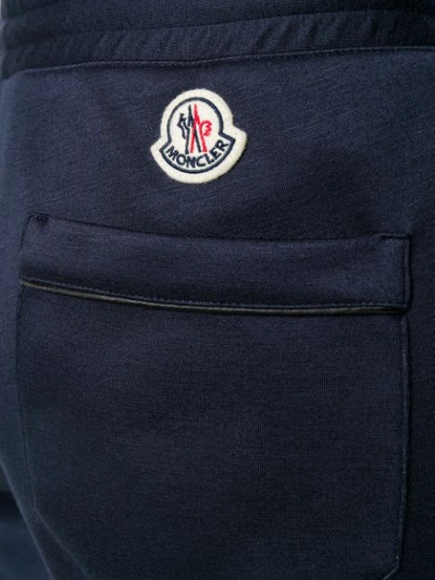Shop Moncler Logo Patch Cropped Track Pants In Blue