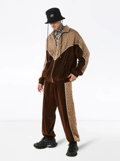 Shop Gucci Gg Rhombus Velvet Track Pants In Brown