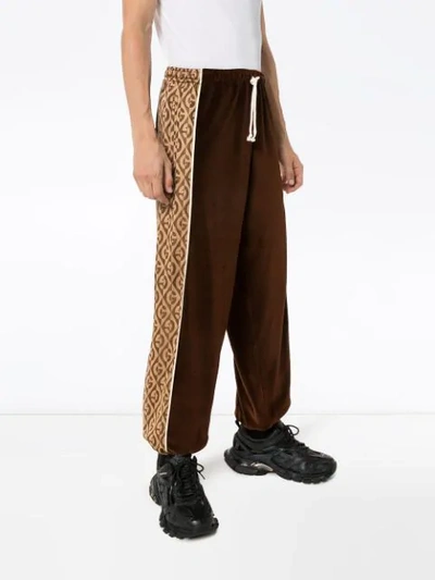 Shop Gucci Gg Rhombus Velvet Track Pants In Brown