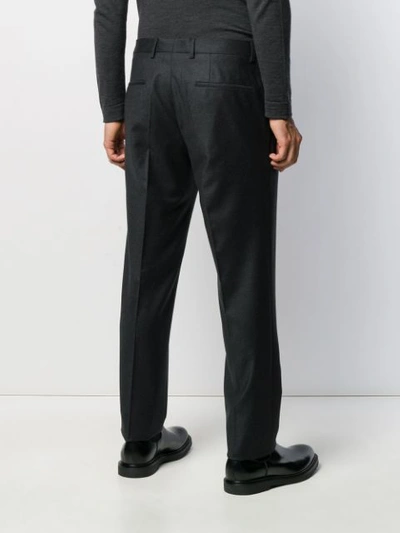 Shop Hugo Boss Tapered Pleated Trousers In Grey