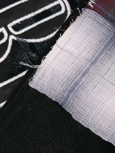 Shop Amiri Skinny Patchwork Jeans In Black