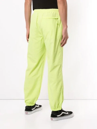 Shop Supreme Champion Track Pants In Yellow