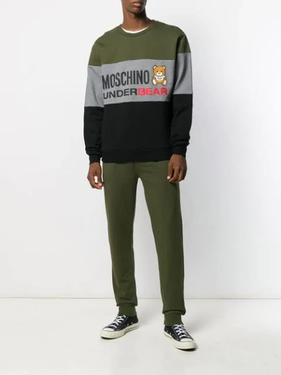 Shop Moschino Logo Tracksuit Bottoms In Green
