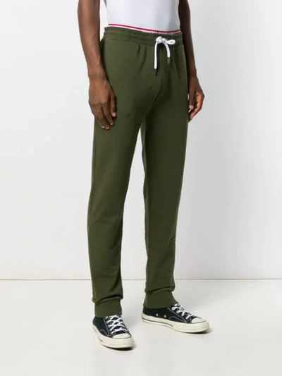 Shop Moschino Logo Tracksuit Bottoms In Green