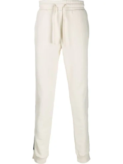 Shop Tommy Hilfiger Drawstring Track Trousers In White