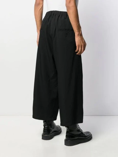 Shop Yohji Yamamoto Wide Leg Pants In Black