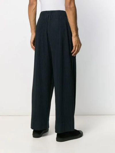 Shop Issey Miyake Pleated Casual Trousers In Blue
