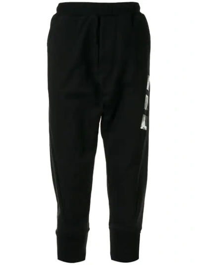 Shop Julius Cropped Track Pants In Black