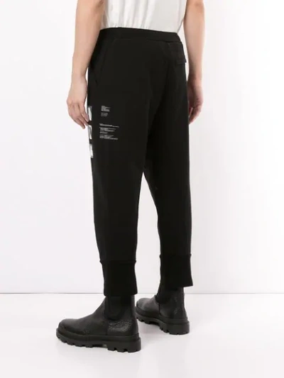 Shop Julius Cropped Track Pants In Black