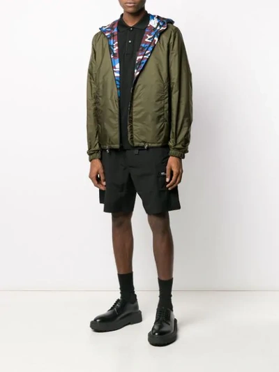 Shop Prada Camouflage Print Reversible Windbreaker In Zqb Multicolor