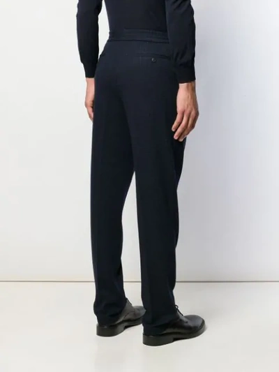 Shop Ferragamo Houndstooth Print Tapered Trousers In Blue