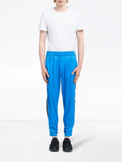 Shop Prada Runproof Technical Fleece Trousers In Blue