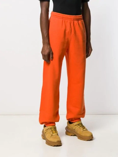 Shop Off-white Logo Print Track Pants In Orange