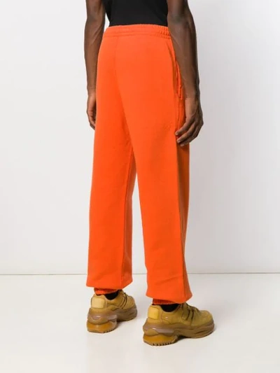 Shop Off-white Logo Print Track Pants In Orange