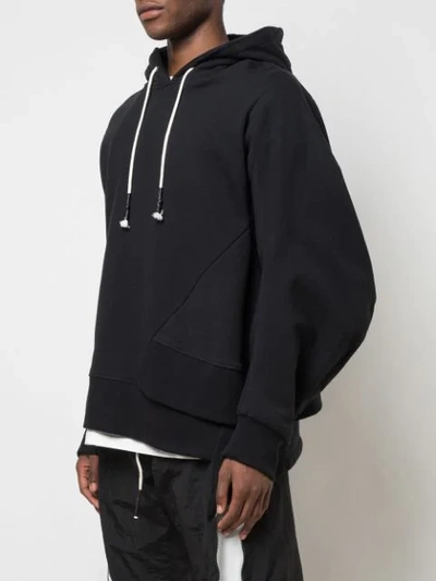 Shop Mostly Heard Rarely Seen Staggered Hem Hoodie In Black