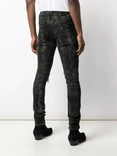 Shop Amiri Python Print Skinny Jeans In Grey