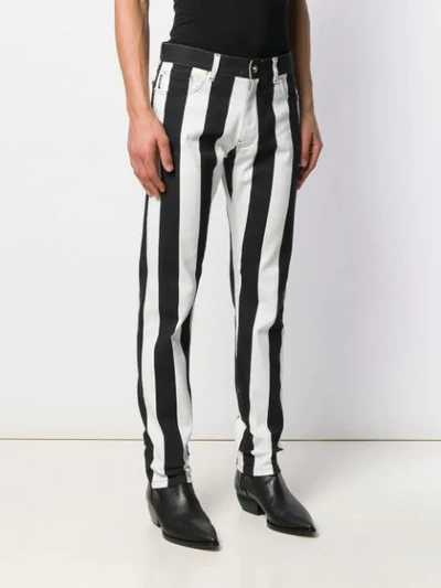 Shop Versace Striped Slim-fit Jeans In Black