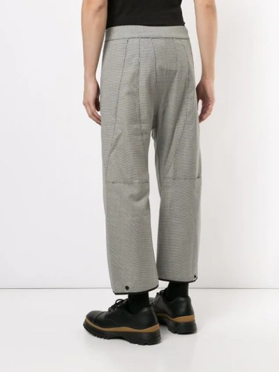 Shop Kiko Kostadinov Micro Print Loose Fit Trousers In Grey