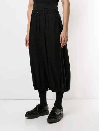 Shop Yohji Yamamoto Cropped Dropped-crotch Trousers In Black