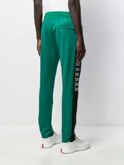 Shop Dolce & Gabbana Dg Logo Track Pants In Green