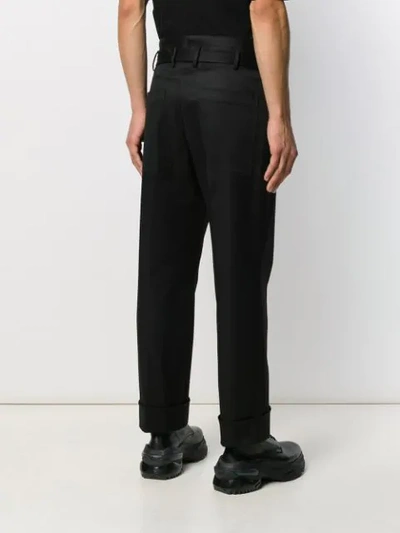 Shop Neil Barrett Belted Trousers In Black