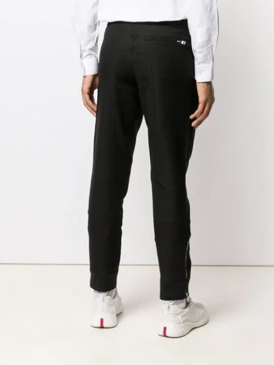 Shop Alexander Mcqueen Zipped Details Trousers - Schwarz In Black