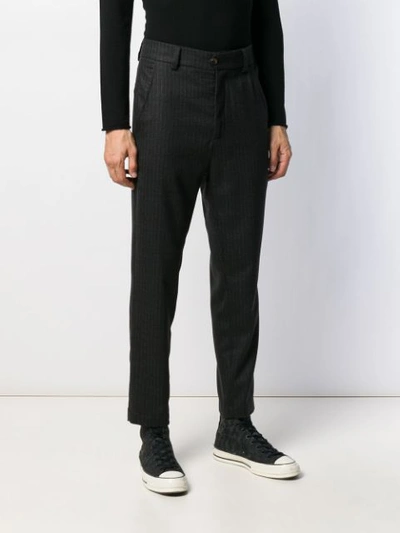 Shop Société Anonyme Tapered Pinstripe Trousers In Black