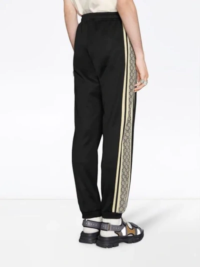 Shop Gucci Gg Interlocking Chain Stripe Track Trousers - Black