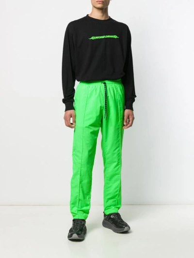 Shop Andrea Crews Piped Seam Track Pants In Green