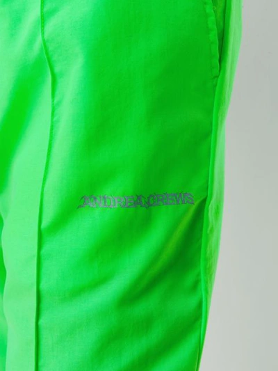 Shop Andrea Crews Piped Seam Track Pants In Green