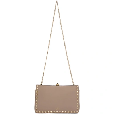 Shop Valentino Pink  Garavani Rockstud Clutch Bag In P45 Poudre