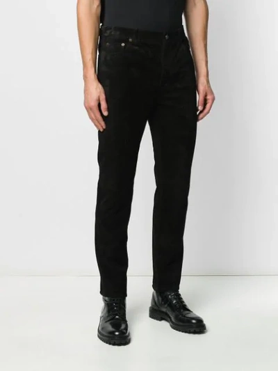 Shop Saint Laurent Slim-fit Velvet Trousers In Black