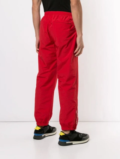 Shop Supreme Warm Up Trousers In Red