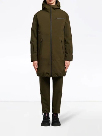 Shop Prada Hooded Raincoat In Green