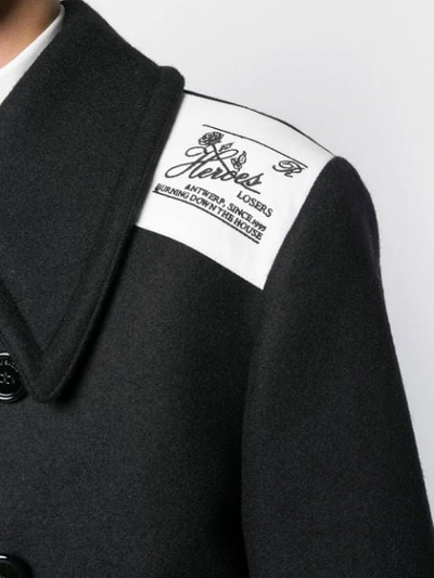 Shop Raf Simons Double Breasted Logo Patch Coat In Black