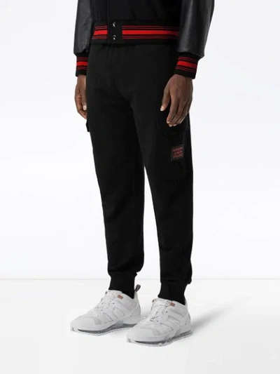 Shop Burberry Logo-appliqued Sweatpants In Black