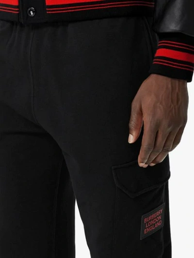 Shop Burberry Logo-appliqued Sweatpants In Black