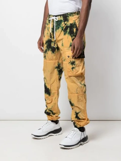 Shop Palm Angels Tie-dye Cargo Trousers In Yellow