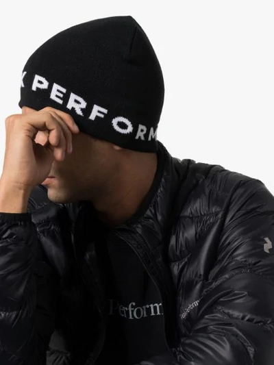 Shop Peak Performance Logo Intarsia Beanie Hat In Black