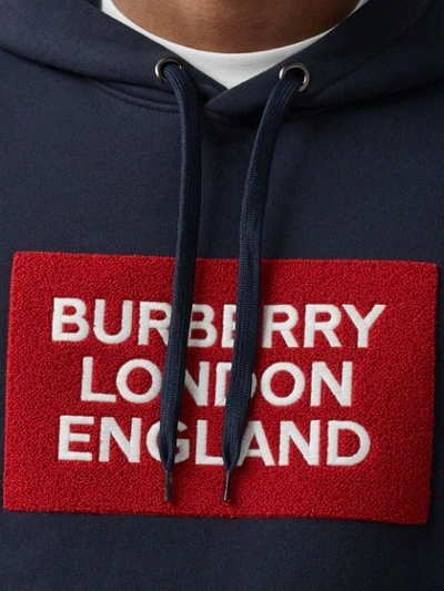 Shop Burberry Logo Patch Drawstring Hoodie In Blue
