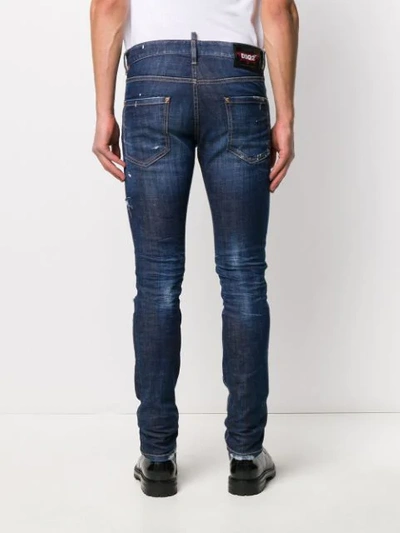 Shop Dsquared2 Distressed Effect Skinny Jeans In Blue