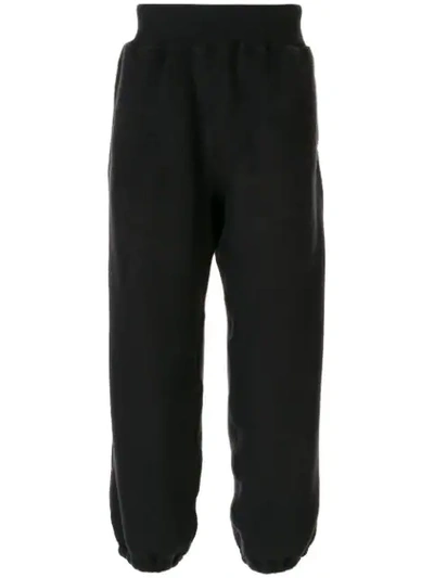 Shop Undercover Oversized Track Trousers In Black